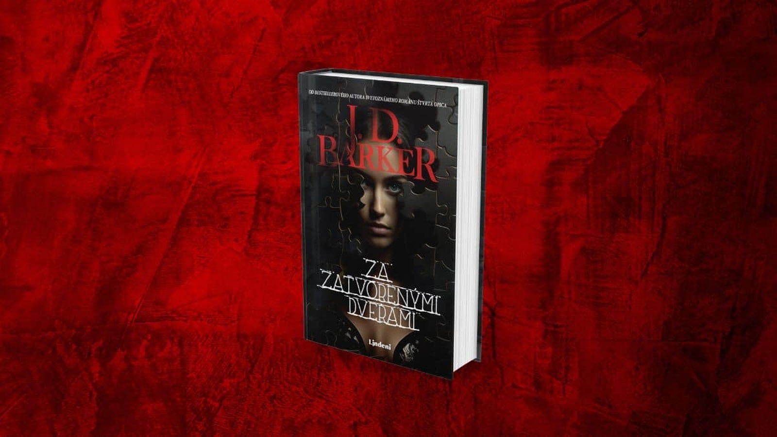 Obálka knihy Za zatvorenými dverami od J.D. Barkera, vydanej pod značkou Lindeni. Temný triler s mysterióznou atmosférou, na pozadí červená textúra.